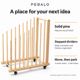 Solid pine rack with natural finish, stepped dividers and four swivel casters, two with brakes. Digitally composed from supplier photograph.